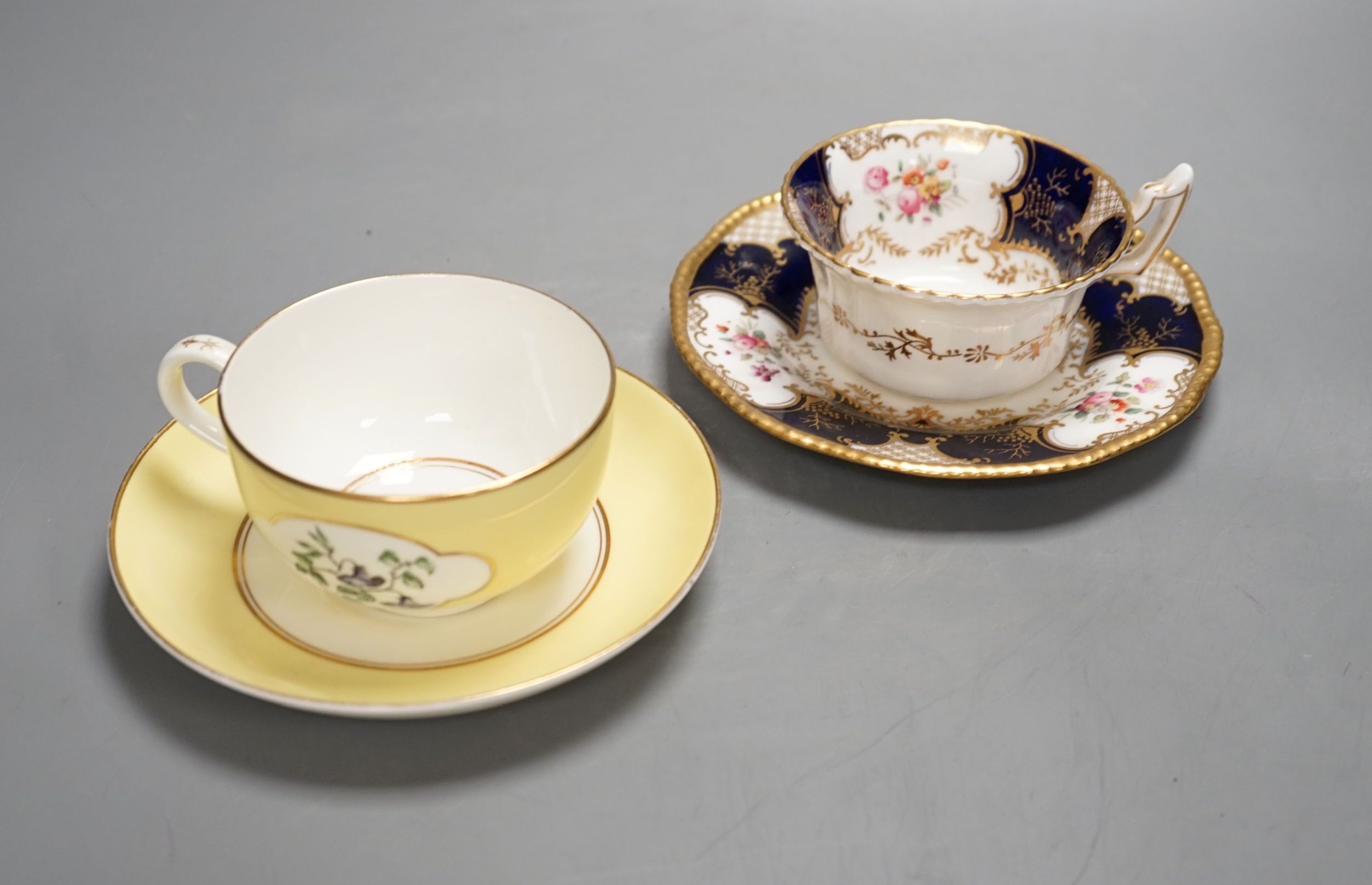 Royal Worcester for Aspreys - a set of six flower painted cups and saucers and four sideplates together with a Coalport part tea set